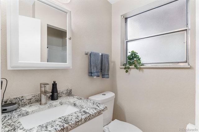 8485 W 44th Ave, Wheat Ridge, CO 80033 - half bathroom with toilet and vanity