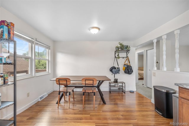 8485 W 44th Ave, Wheat Ridge, CO 80033 - dining area with light wood finished floors and baseboards