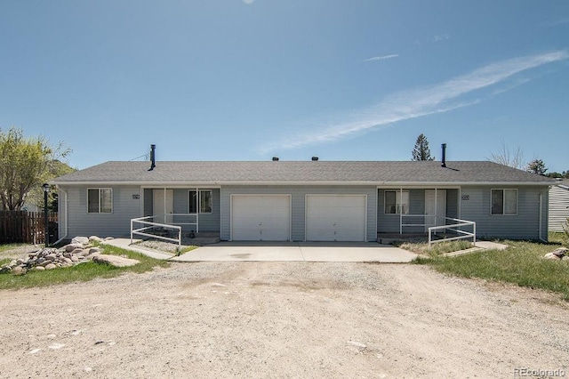 single story home featuring a garage