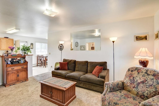 carpeted living room with a baseboard radiator