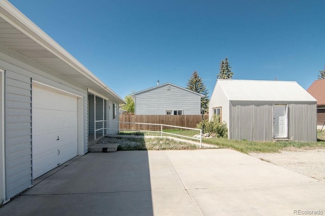 view of patio / terrace featuring a garage