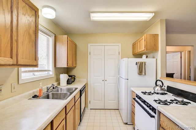 kitchen with sink and white appliances