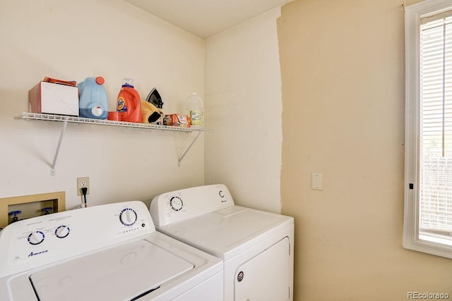 washroom with separate washer and dryer