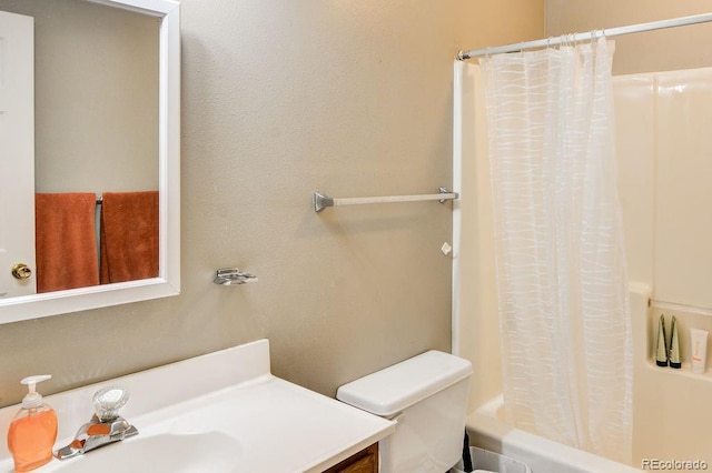 full bathroom with shower / bath combination with curtain, vanity, and toilet