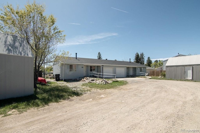 view of front of property featuring a garage