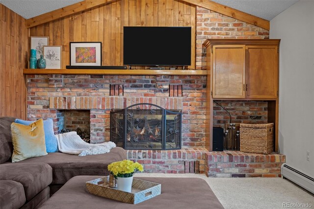 2090 S Gray Dr, Lakewood, CO 80227 - living area featuring wooden walls, carpet, a baseboard radiator, lofted ceiling with beams, and a fireplace