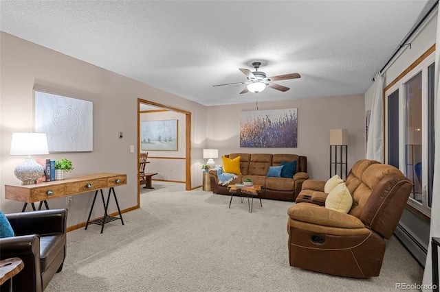 2090 S Gray Dr, Lakewood, CO 80227 - living room with baseboards, carpet, a textured ceiling, a ceiling fan, and a baseboard radiator