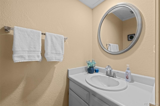 2090 S Gray Dr, Lakewood, CO 80227 - bathroom featuring vanity and a textured wall
