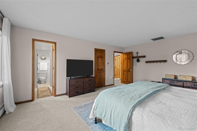 2090 S Gray Dr, Lakewood, CO 80227 - bedroom with visible vents, baseboards, light colored carpet, and ensuite bathroom