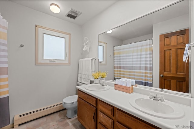 2090 S Gray Dr, Lakewood, CO 80227 - full bath featuring a baseboard heating unit, toilet, visible vents, and a sink