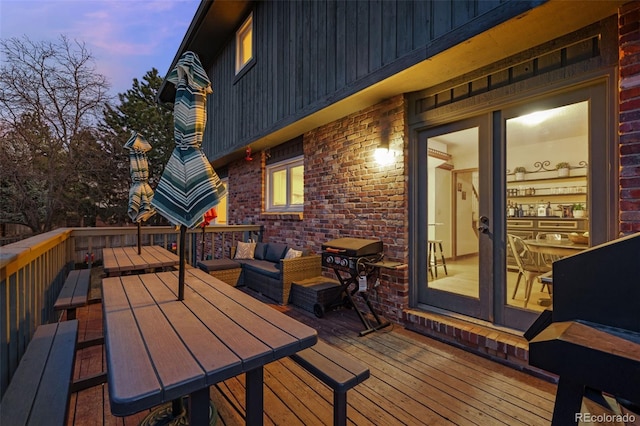 2090 S Gray Dr, Lakewood, CO 80227 - deck at dusk featuring a grill