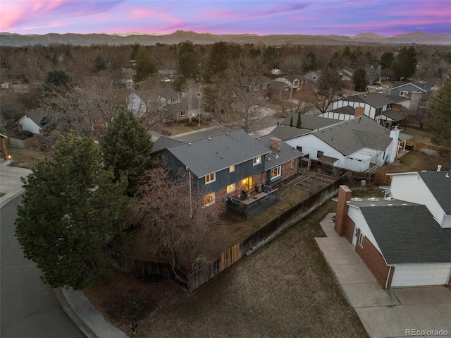2090 S Gray Dr, Lakewood, CO 80227 - aerial view at dusk featuring a mountain view and a residential view