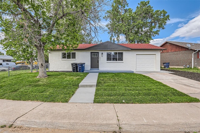 14317 Olmsted Dr, Denver, CO 80239 - single story home featuring a garage and concrete driveway