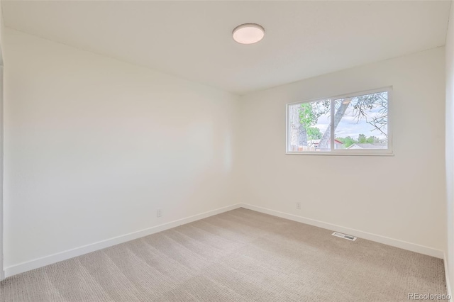 14317 Olmsted Dr, Denver, CO 80239 - spare room with light colored carpet and baseboards