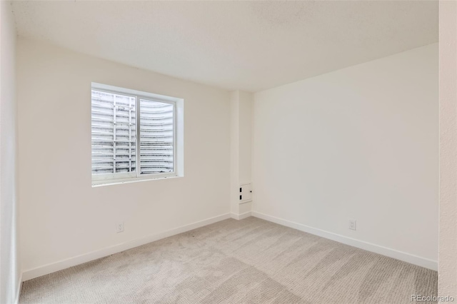14317 Olmsted Dr, Denver, CO 80239 - unfurnished room featuring carpet flooring and baseboards