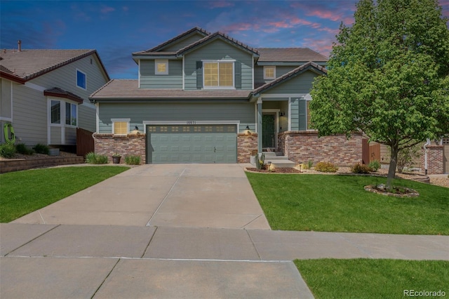16671 E Prairie Goat Ave, Parker, CO 80134 - craftsman-style house featuring brick siding, driveway, an attached garage, and a tiled roof