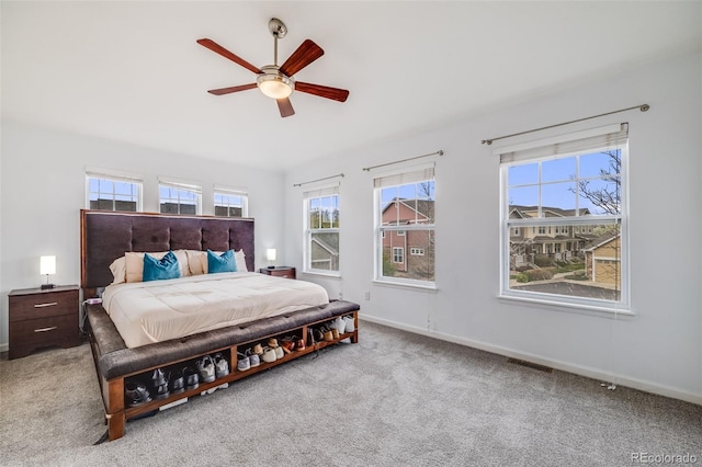 22765 E Ottawa Pl, Aurora, CO 80016 - carpeted bedroom with baseboards and a ceiling fan