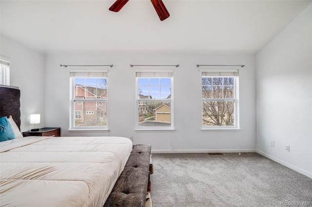 22765 E Ottawa Pl, Aurora, CO 80016 - carpeted bedroom featuring baseboards and a ceiling fan