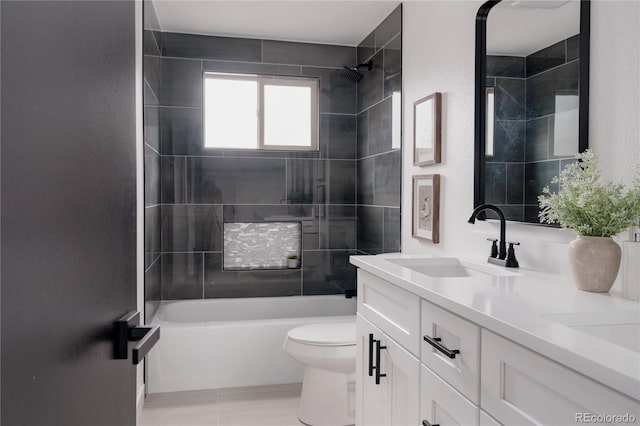 8249 Zephyr St, Arvada, CO 80005 - full bath with double vanity, tub / shower combination, and tile patterned floors