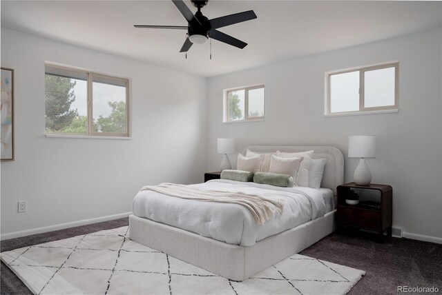 8249 Zephyr St, Arvada, CO 80005 - carpeted bedroom with baseboards and ceiling fan