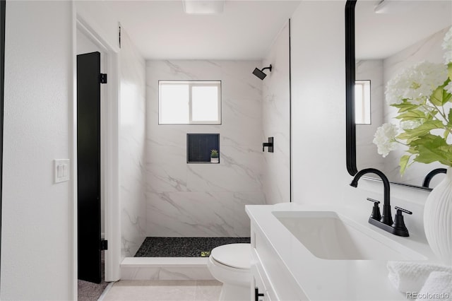 8249 Zephyr St, Arvada, CO 80005 - full bath with vanity and a marble finish shower