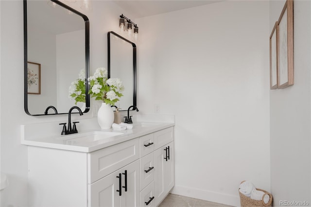 8249 Zephyr St, Arvada, CO 80005 - full bath featuring double vanity and tile patterned flooring