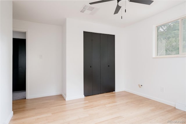 8249 Zephyr St, Arvada, CO 80005 - unfurnished bedroom featuring light wood-style floors, a closet, and ceiling fan