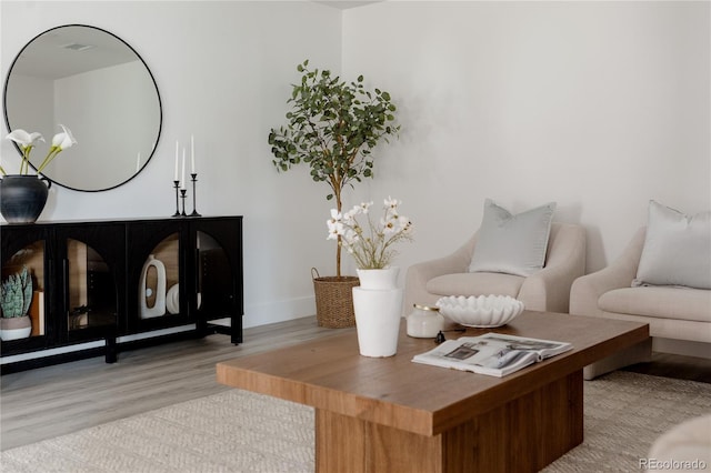 8249 Zephyr St, Arvada, CO 80005 - living room with light wood finished floors and baseboards