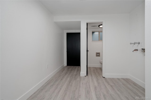 8249 Zephyr St, Arvada, CO 80005 - unfurnished bedroom with light wood-style floors and baseboards