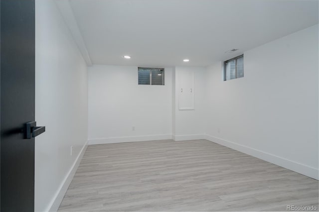 8249 Zephyr St, Arvada, CO 80005 - below grade area featuring recessed lighting and light wood-style flooring