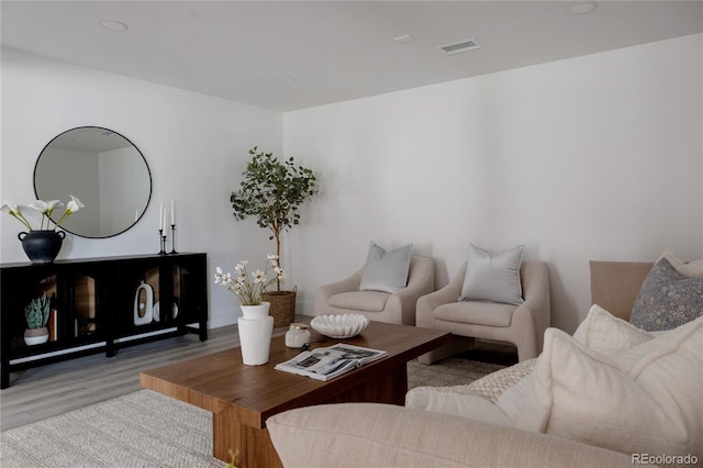 8249 Zephyr St, Arvada, CO 80005 - living area featuring wood finished floors