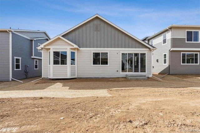 back of property with board and batten siding