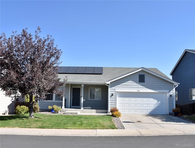 ranch-style house with a front yard, a garage, solar panels, and a porch