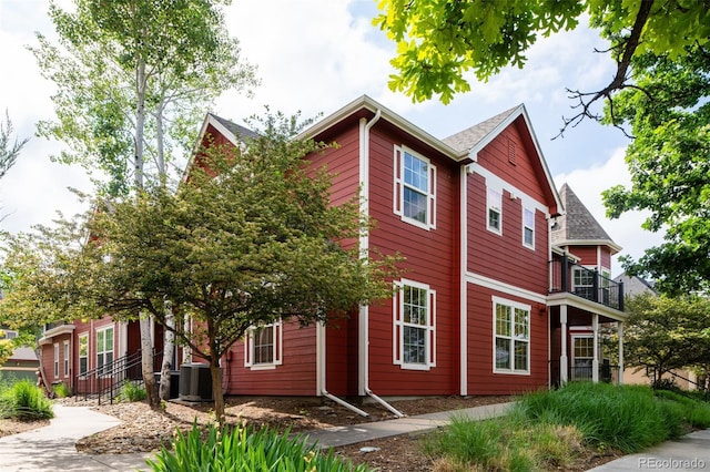 7777 E 23rd Ave Unit 1202, Denver, CO 80238 - view of home's exterior featuring a central AC unit