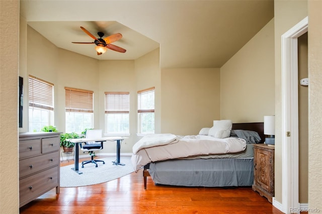 7777 E 23rd Ave Unit 1202, Denver, CO 80238 - bedroom featuring hardwood / wood-style flooring, an office area, and a ceiling fan