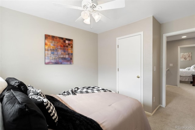 bedroom with recessed lighting, baseboards, light colored carpet, and ceiling fan