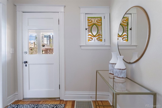 doorway to outside with hardwood / wood-style floors