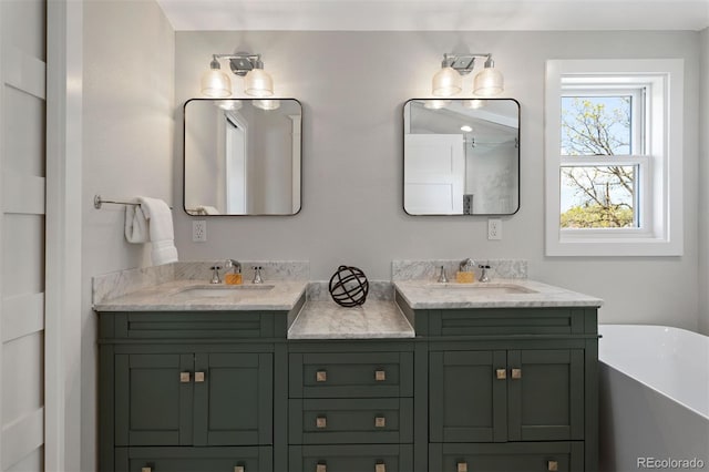 bathroom featuring a bath and vanity