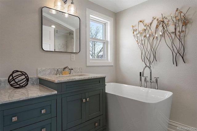 bathroom featuring a bathtub and vanity