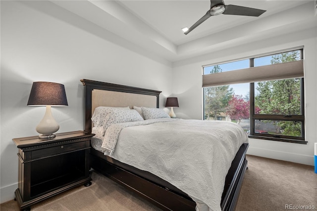 bedroom featuring ceiling fan and carpet floors