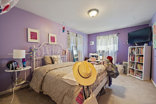 4855 E Atlantic Pl, Denver, CO 80222 - carpeted bedroom with baseboards