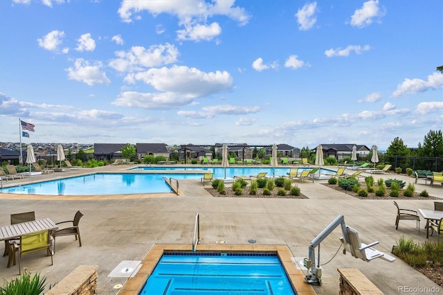 22183 E Rocky Top Pl, Aurora, CO 80016 - community pool featuring a patio area
