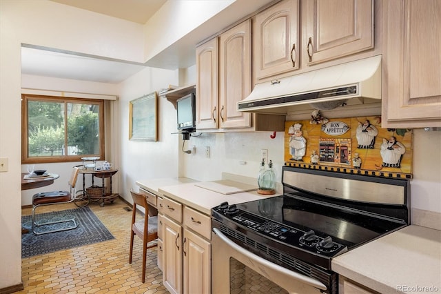 4936 Clubhouse Cir, Boulder, CO 80301 - kitchen with electric stove, under cabinet range hood, light brown cabinetry, and light countertops