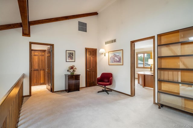 4936 Clubhouse Cir, Boulder, CO 80301 - sitting room with light carpet, beam ceiling, and high vaulted ceiling