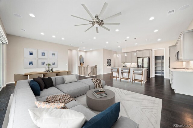 6725 Mentha Dr, Castle Rock, CO 80108 - living room featuring visible vents, recessed lighting, dark wood finished floors, and ceiling fan