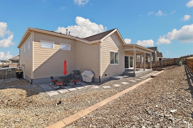 6725 Mentha Dr, Castle Rock, CO 80108 - rear view of house featuring a patio and a fenced backyard
