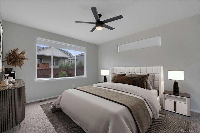 1867 Abundance Dr, Windsor, CO 80550 - carpeted bedroom with baseboards and a ceiling fan