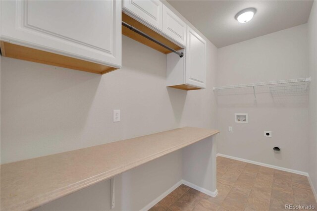 1867 Abundance Dr, Windsor, CO 80550 - clothes washing area with cabinet space, electric dryer hookup, baseboards, and hookup for a washing machine