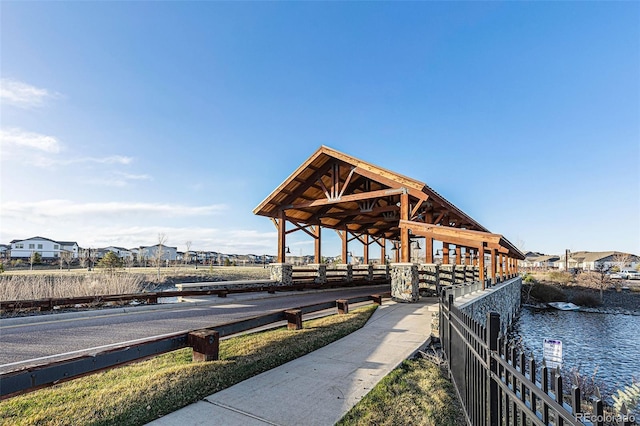 1867 Abundance Dr, Windsor, CO 80550 - dock area featuring fence, a gazebo, and a water view