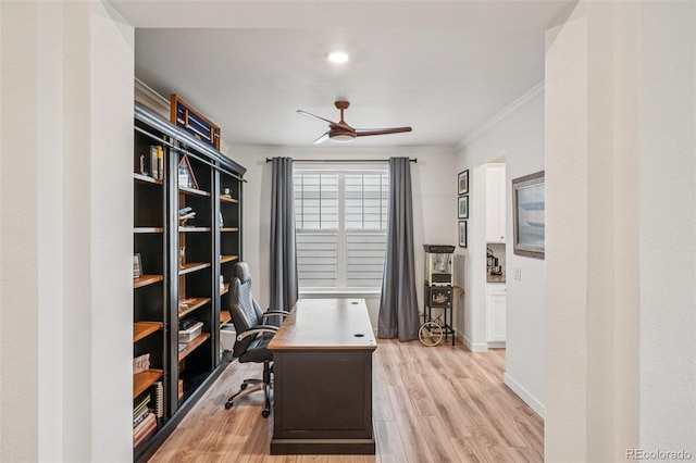 12841 Lake Port St, Longmont, CO 80504 - office area featuring ceiling fan, light wood-style floors, and crown molding